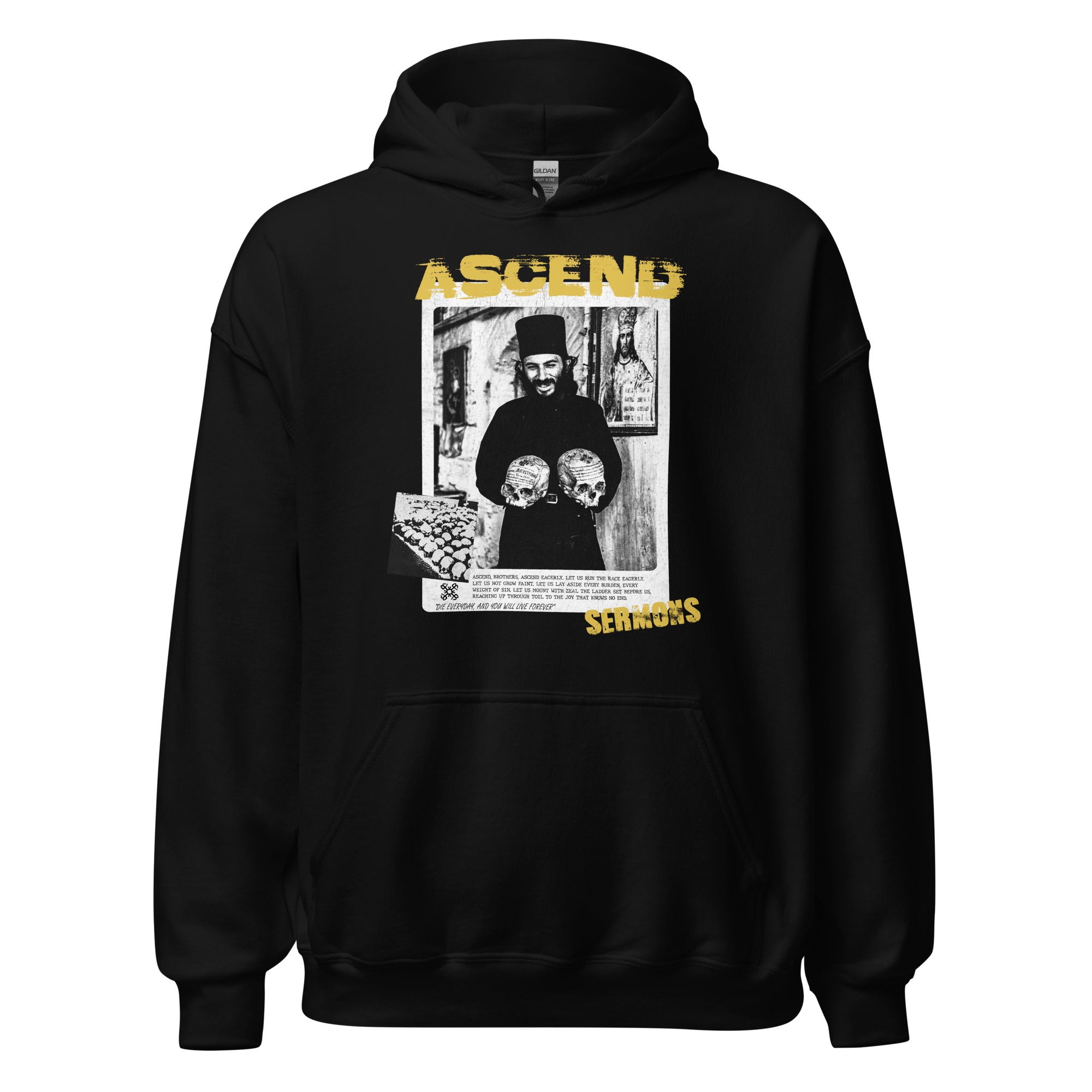 Front view of the black “Ascend” unisex hoodie featuring an Orthodox monk joyfully holding two inscribed skulls, symbolizing repentance. Design includes the word “ASCEND” in bold yellow and a quote urging spiritual ascent through toil and zeal. Orthodox Christian clothing by Sermons