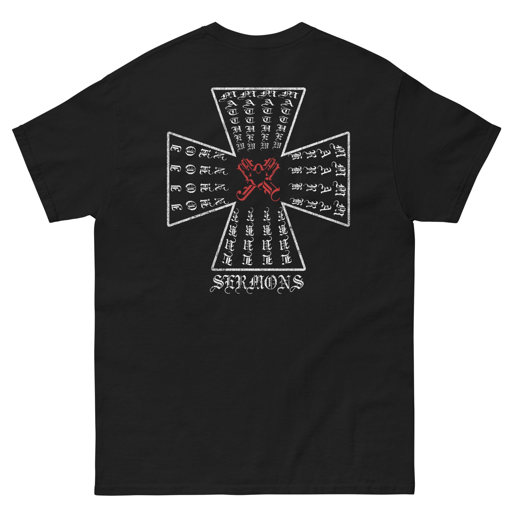 The back view of the four evangelists cross T-Shirt in black, The design features the names of the Four Holy Evangelists Matthew, Mark, Luke, and John are arranged within a cross, with their four initials united at the center. At the center of the Orthodox life stands the written Word, handed down through the ages by the faithful.